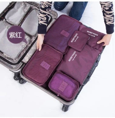 Premium waterproof travel packing cubes in various colors for organized packing and storage