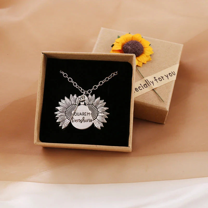 A stunning sunflower pendant necklace with an adjustable chain in various fashionable colors