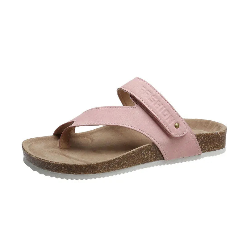 A pair of solid-colour flat toe ring flip-flops with a thick foam sole, shown in blue.