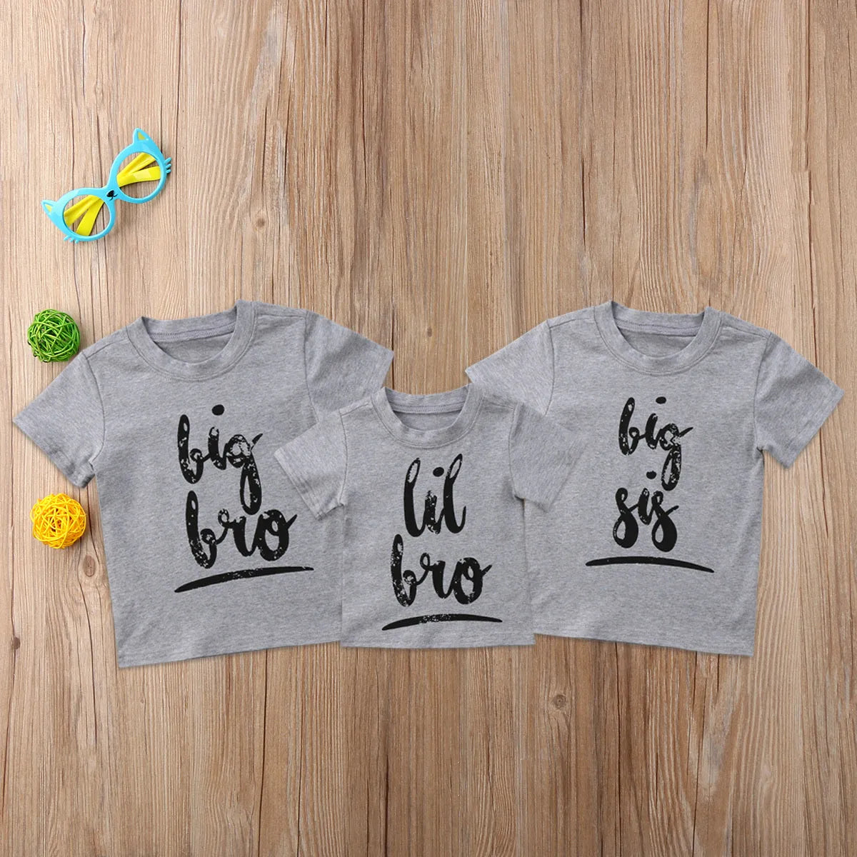 Grey cotton printed t-shirt showing size options from 60cm to 140cm on a size chart
