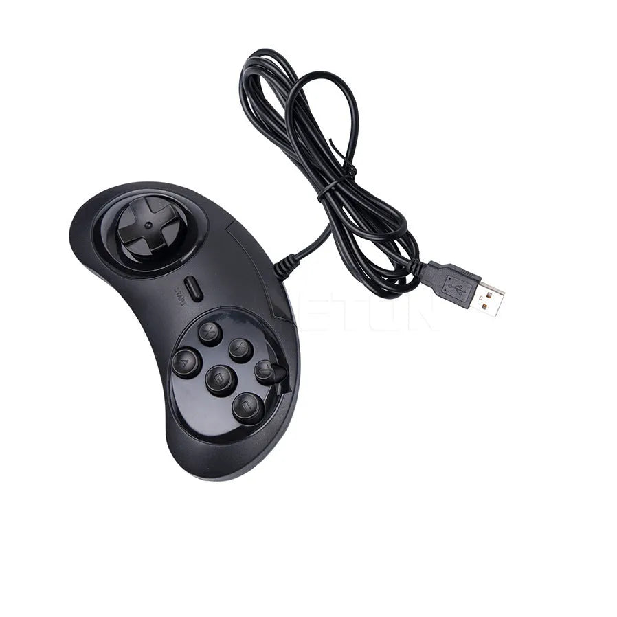 Black Sega USB PC game controller with 1.8m cable on a desk.