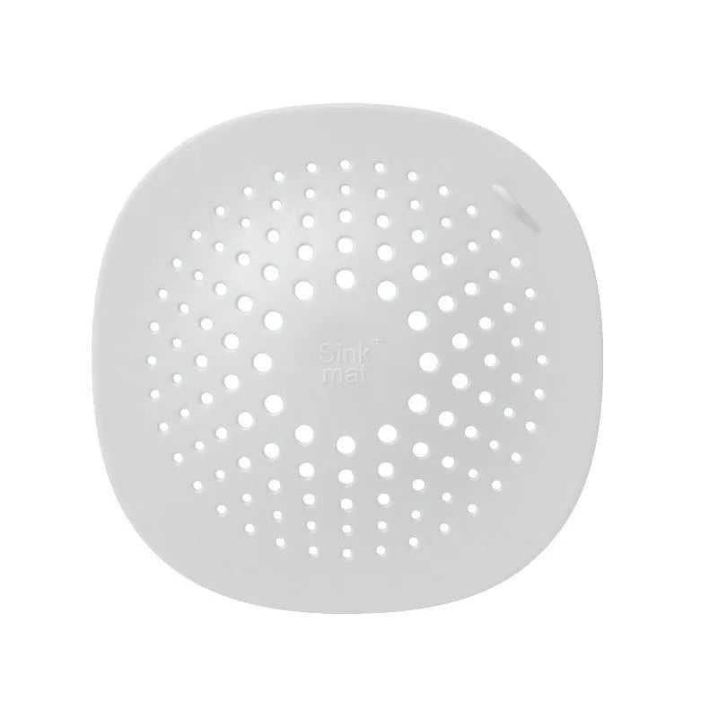 High quality TPR kitchen sink floor drain in dark grey, 145 x 145 mm, on tiled floor
