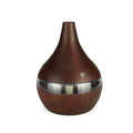 USB-powered mini humidifier in columnar design with wood grain finish and remote control