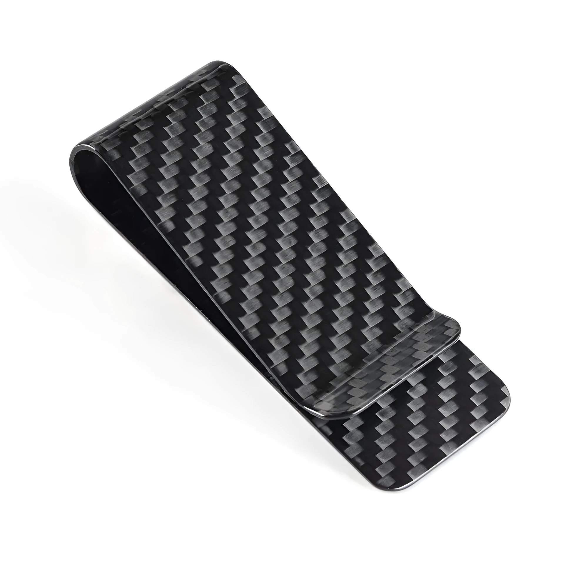 Black glossy striped carbon fibre money clip on a flat surface showing its slim profile and textured pattern
