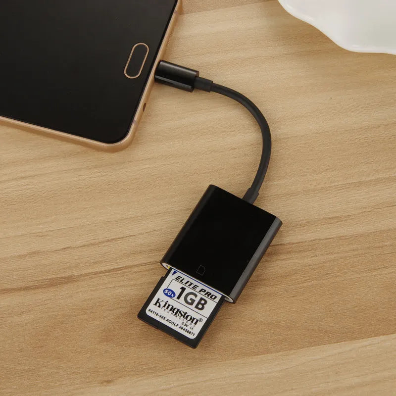 USB 2.0 SD card reader with 10 cm TPE+ABS cable in black colour on white background