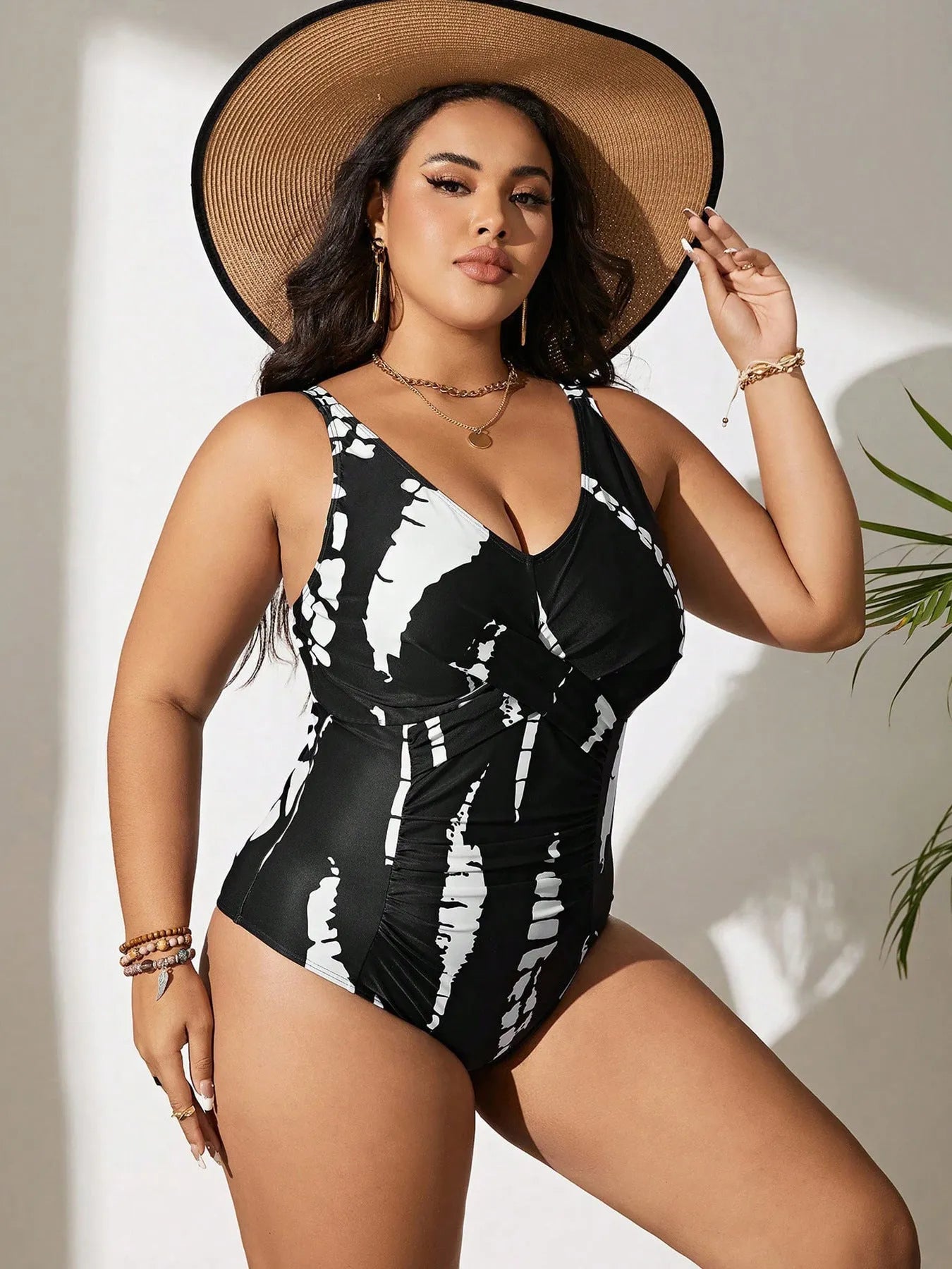 Black one-piece swimsuit with Siamese pattern in extended sizes from 0XL to 5XL