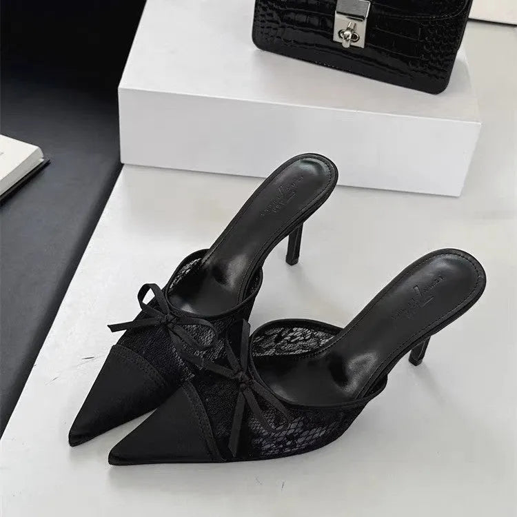 Women's apricot high heels with lace and bowknot detail on a pointed toe.