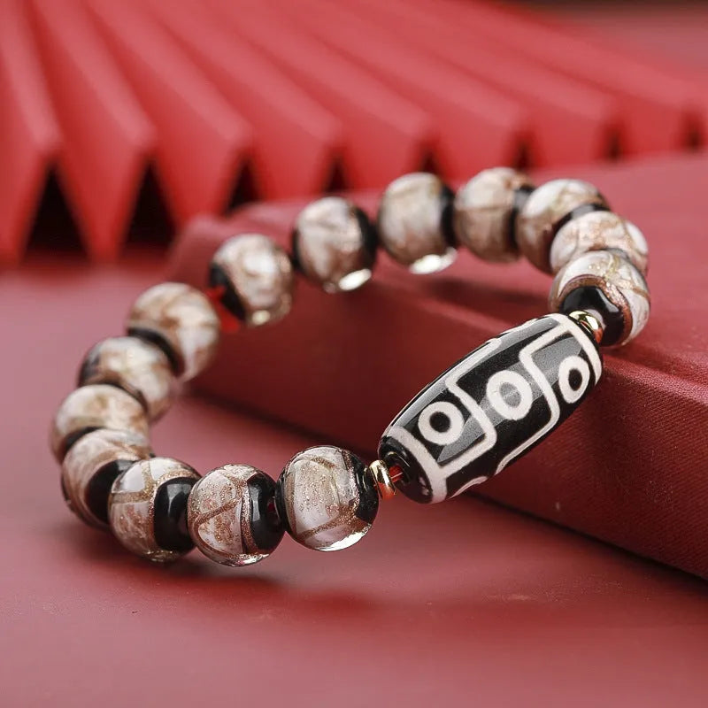 Chinese style bracelet with coloured glaze beads featuring snake patterns in 10mm, 12mm, and 14mm sizes