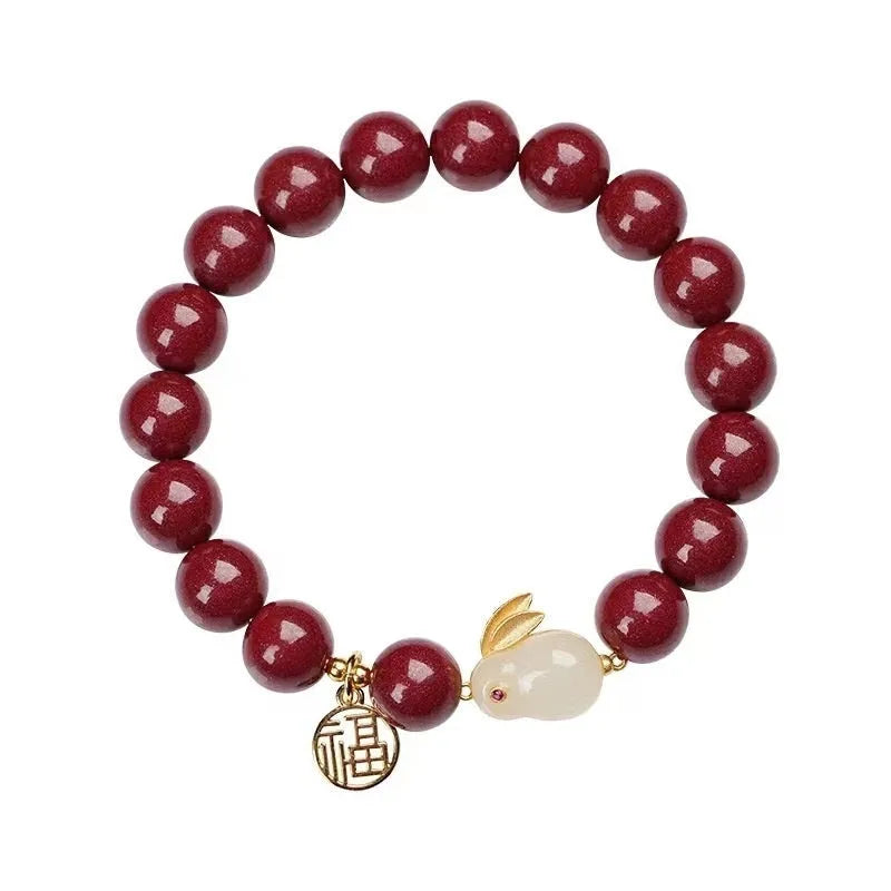 Purple Gold Sand cinnabar bracelet with hare motif in 6mm or 8mm bead sizes