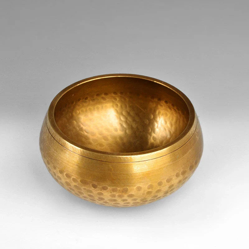 Handcrafted Tibetan singing bowl with a rich, harmonious tone for meditation, relaxation, and wellness