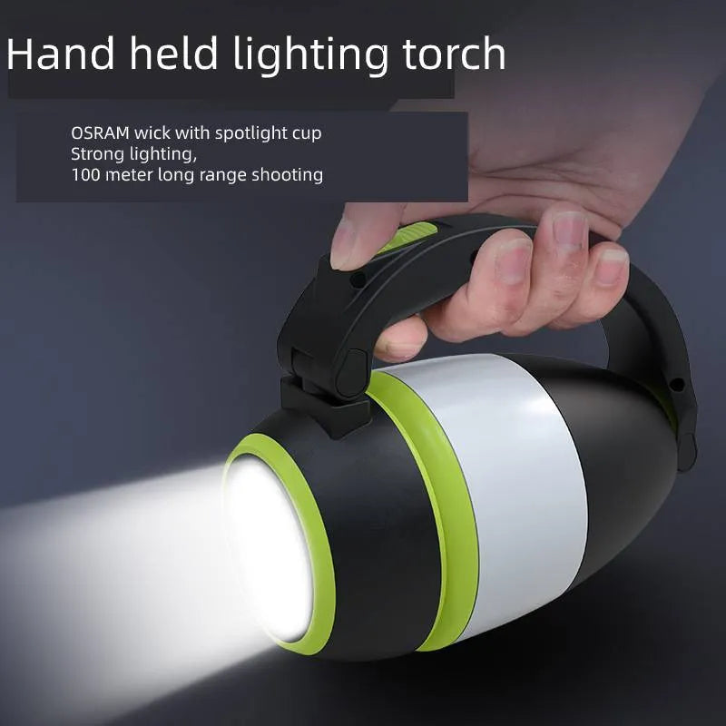 Black green multifunctional 3-in-1 foldable LED lamp with adjustable head on a table.