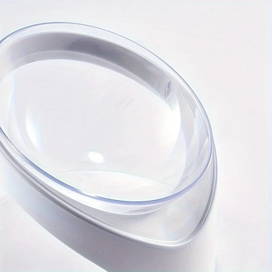 White elevated plastic cat food bowl with a tilted feeding surface for neck protection.