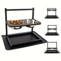 Large black metal dog bowl holder on floor for medium to large dogs.