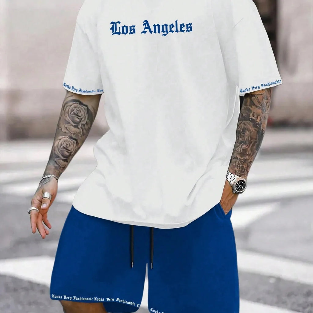 Men's blue printed short-sleeved top and matching shorts, a sports style co-ord set in quick-dry fabric.