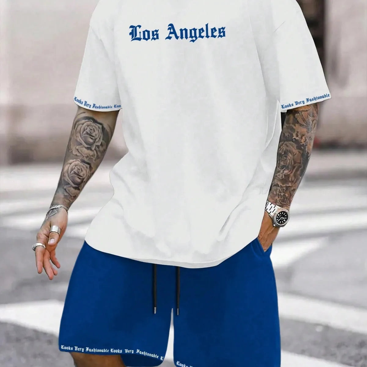 Men's blue printed short-sleeved top and matching shorts, a sports style co-ord set in quick-dry fabric.