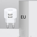 White portable universal dual USB charger with EU, UK and US adaptor heads for international travel