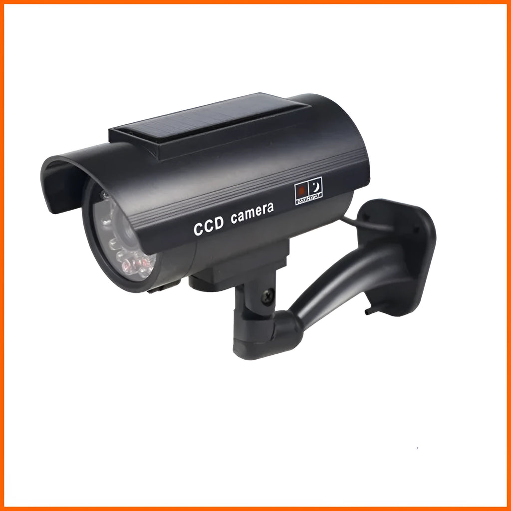 Black plastic solar-powered fake gun security camera with visible solar panel and spot light.