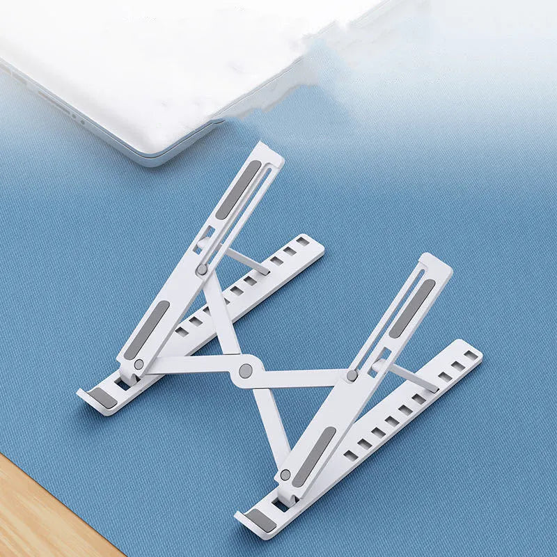 Portable black folding laptop cooling stand showing 10-position adjustable bracket on desktop