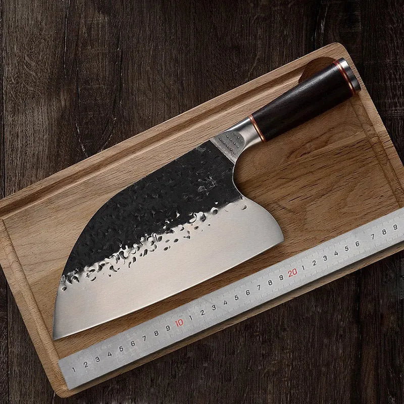 High chromium steel kitchen knife with ebony wood handle for cutting meat and bone.