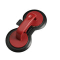 Black and red round plastic burger press for making uniform patties.