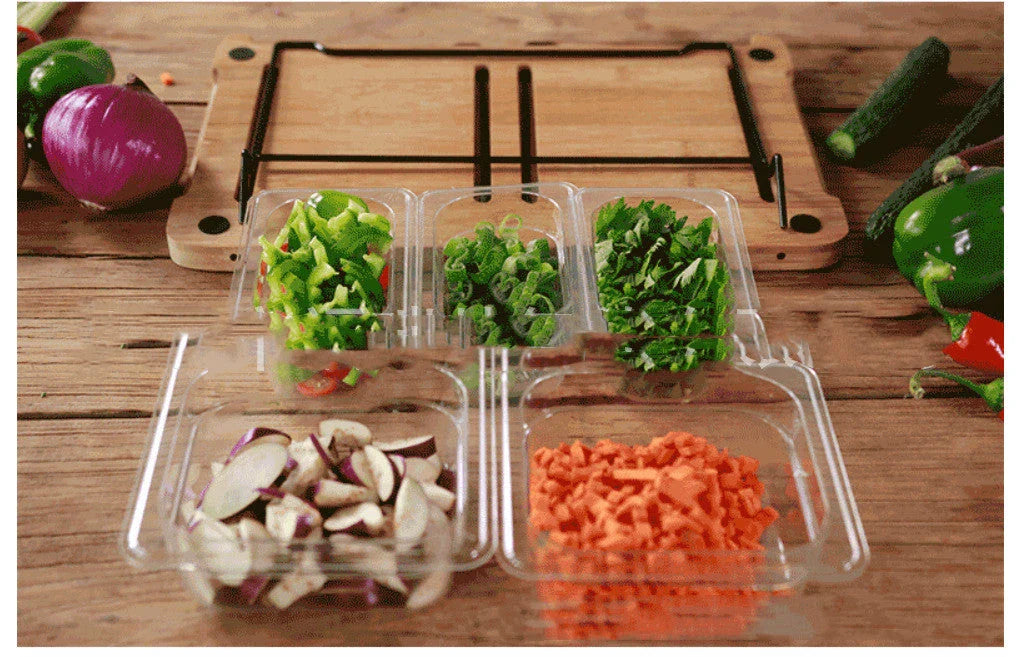 Premium bamboo cutting board with convenient storage trays for chopping, slicing, and dicing ingredients