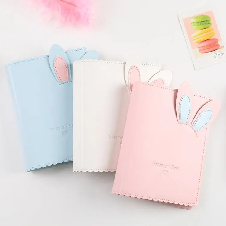 Mini rabbit style photo album with PU cover showing loose-leaf binding for 3-inch photographs