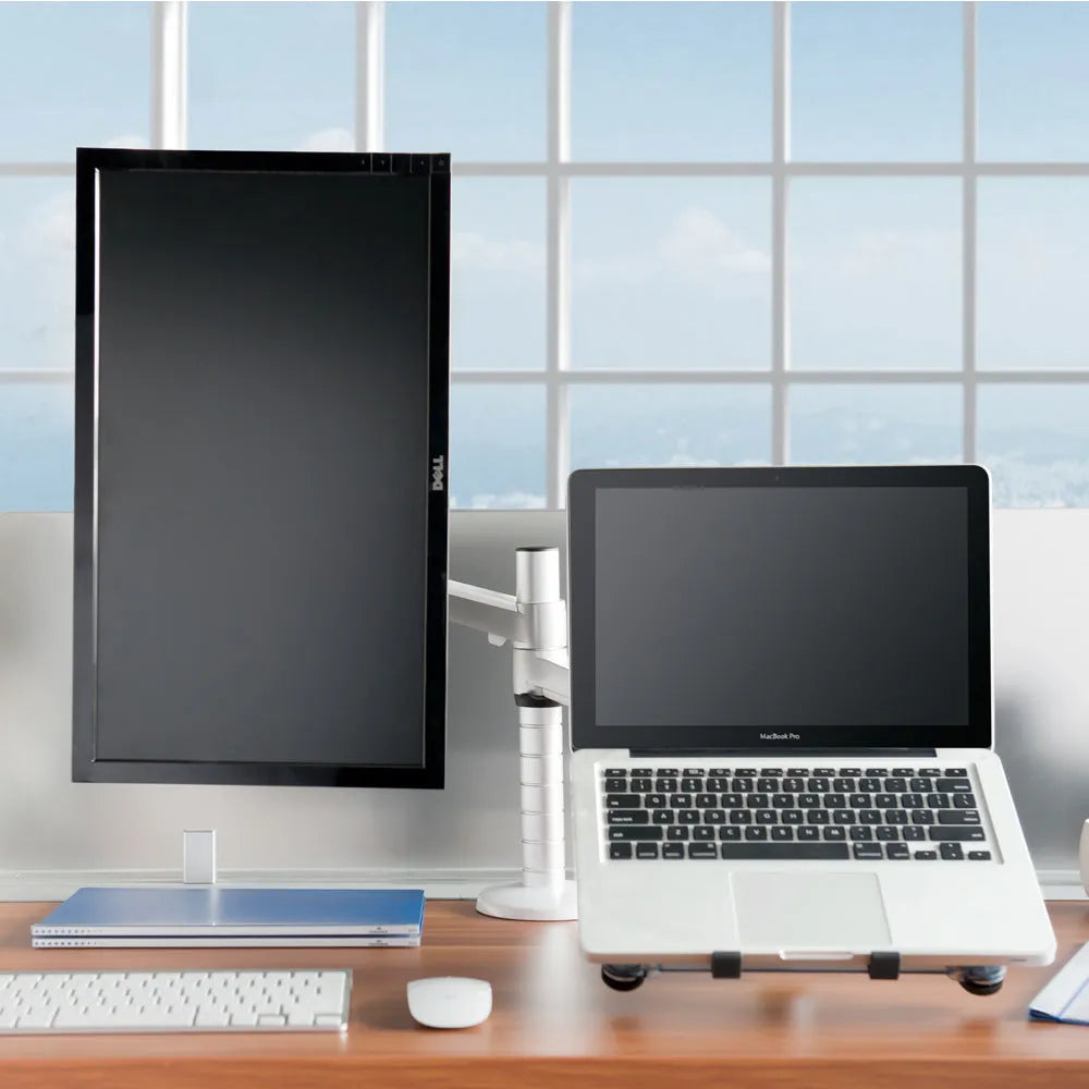 Silver dual-purpose notebook and monitor bracket with double-section arm on a desk
