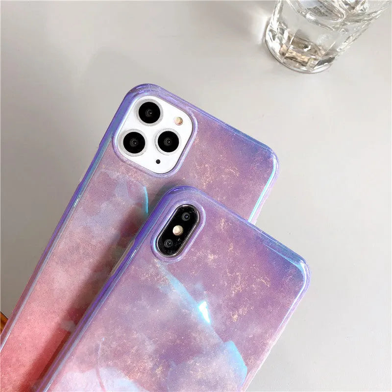 Gradient pink glitter silicone phone case compatible with iPhone models on a white background