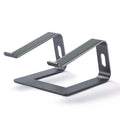 Aluminium alloy notebook cooling bracket in black on a desk with a laptop placed on it