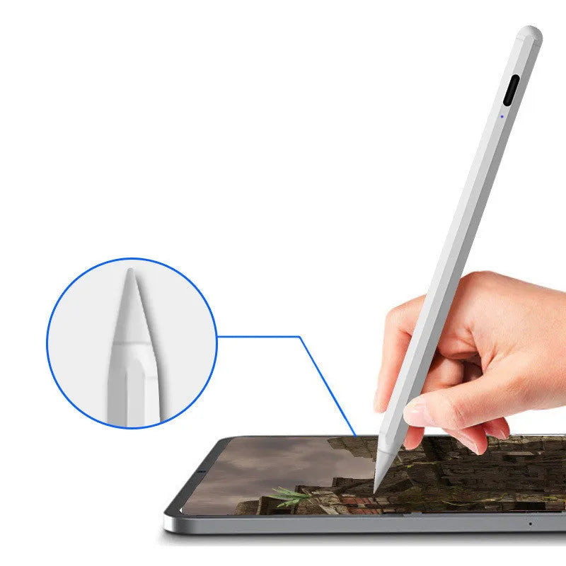 White magnetic stylus pen attached to the side of an iPad.