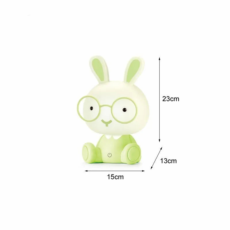 USB-powered cartoon rabbit night light with glasses details in blue, green, or pink colour options