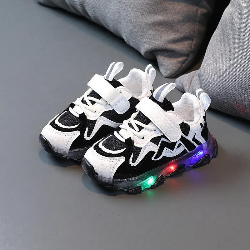 Children's black mesh sneakers with velcro straps and rubber soles