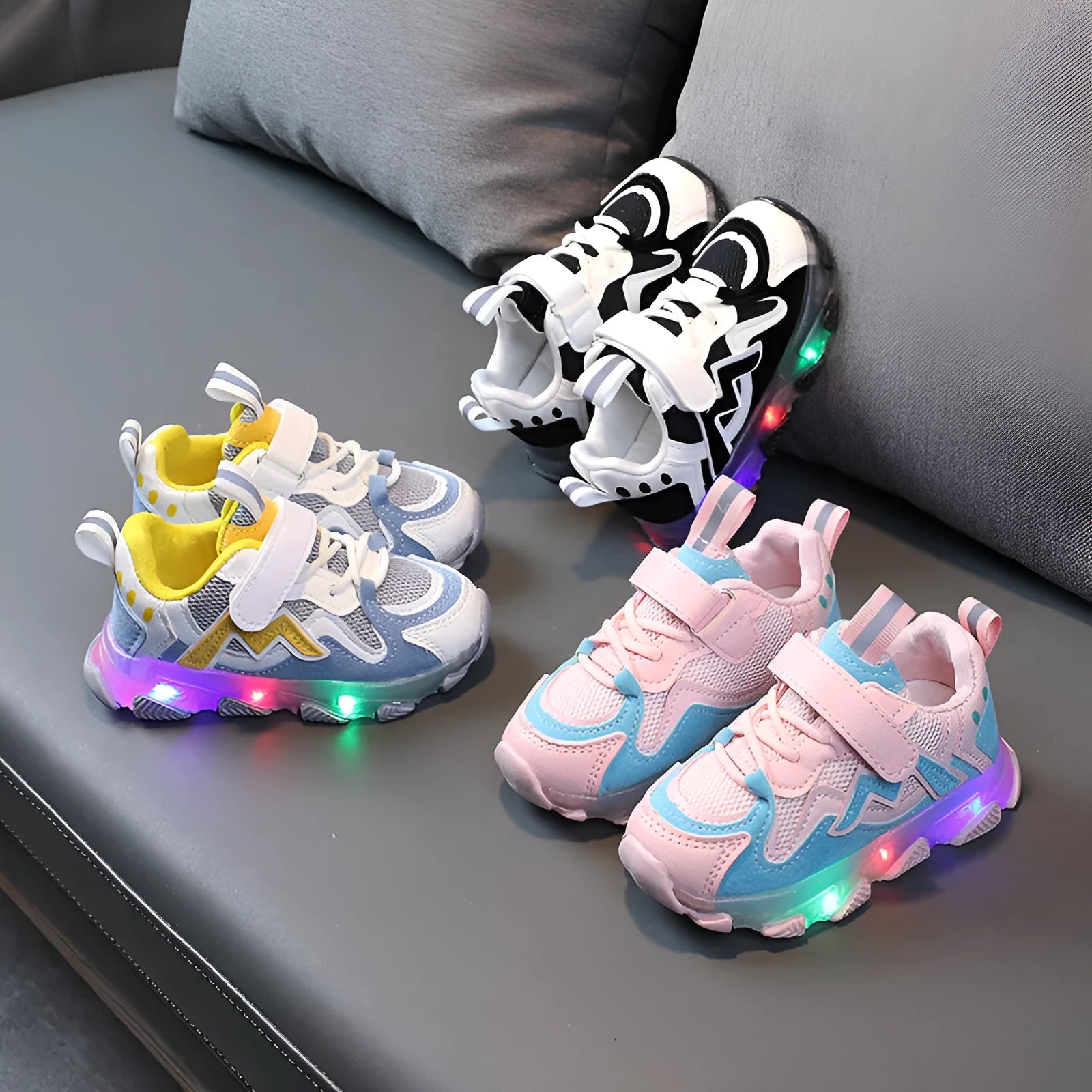 Children's black mesh sneakers with velcro straps and rubber soles