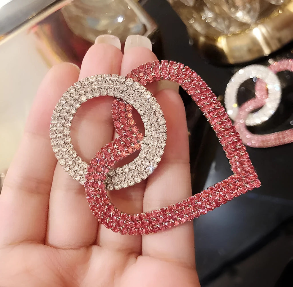 Heart-shaped alloy earrings with diamond-cut finish, 5.8cm x 4.6cm, in pink or green, 20g pair.