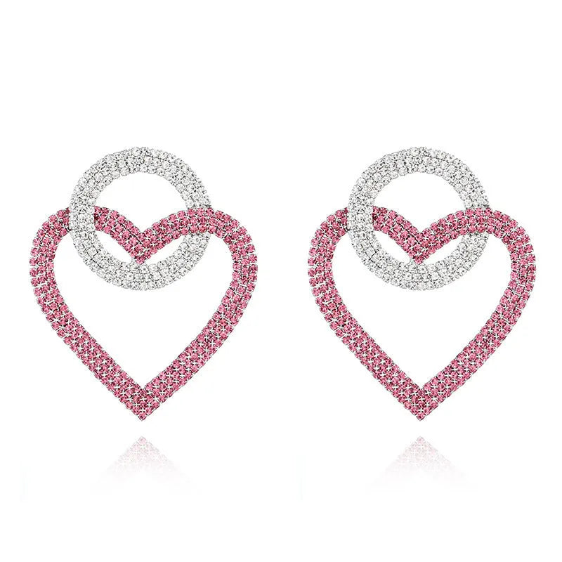 Heart-shaped alloy earrings with diamond-cut finish, 5.8cm x 4.6cm, in pink or green, 20g pair.