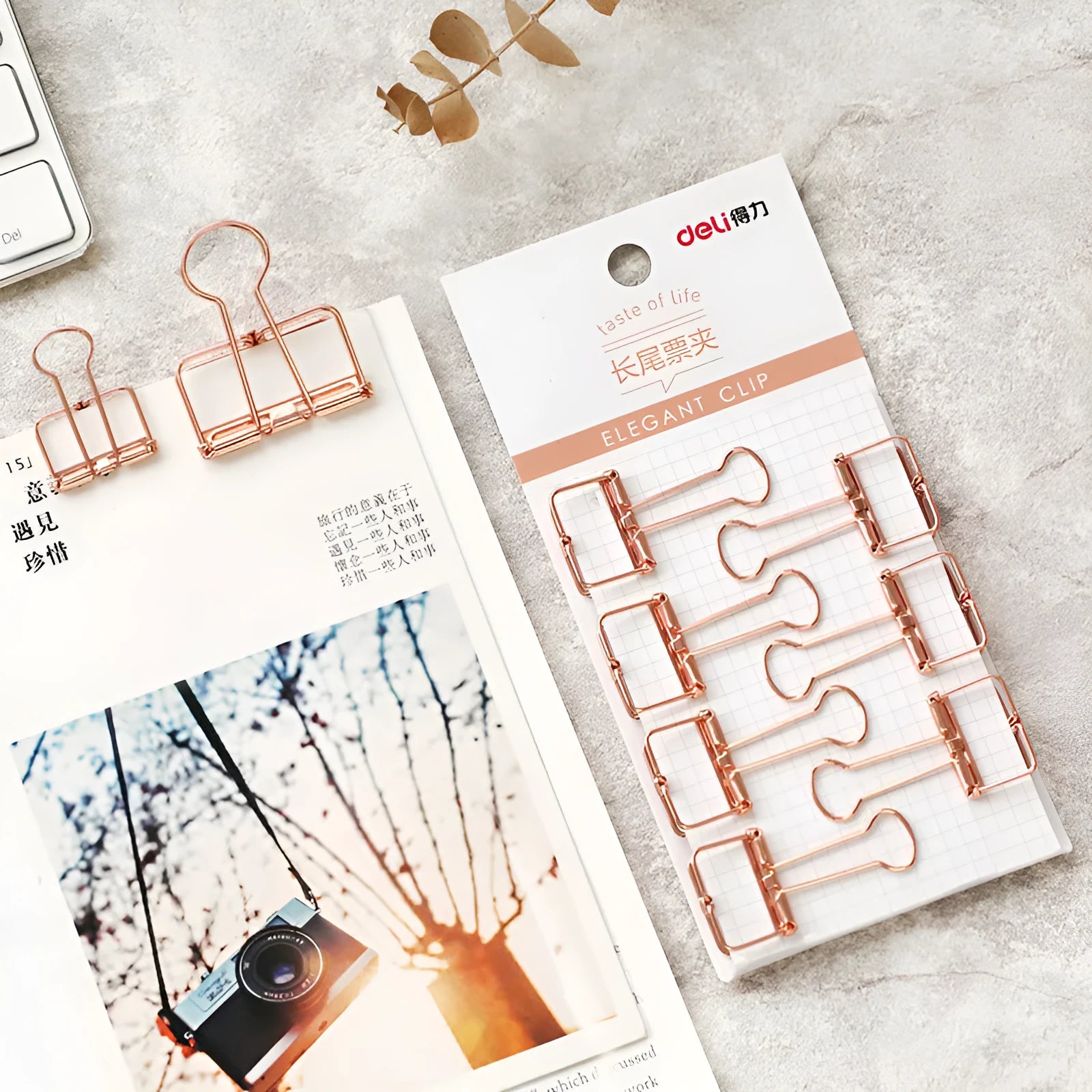 Rose gold metal binder set showing small and large binders for ticket and document storage