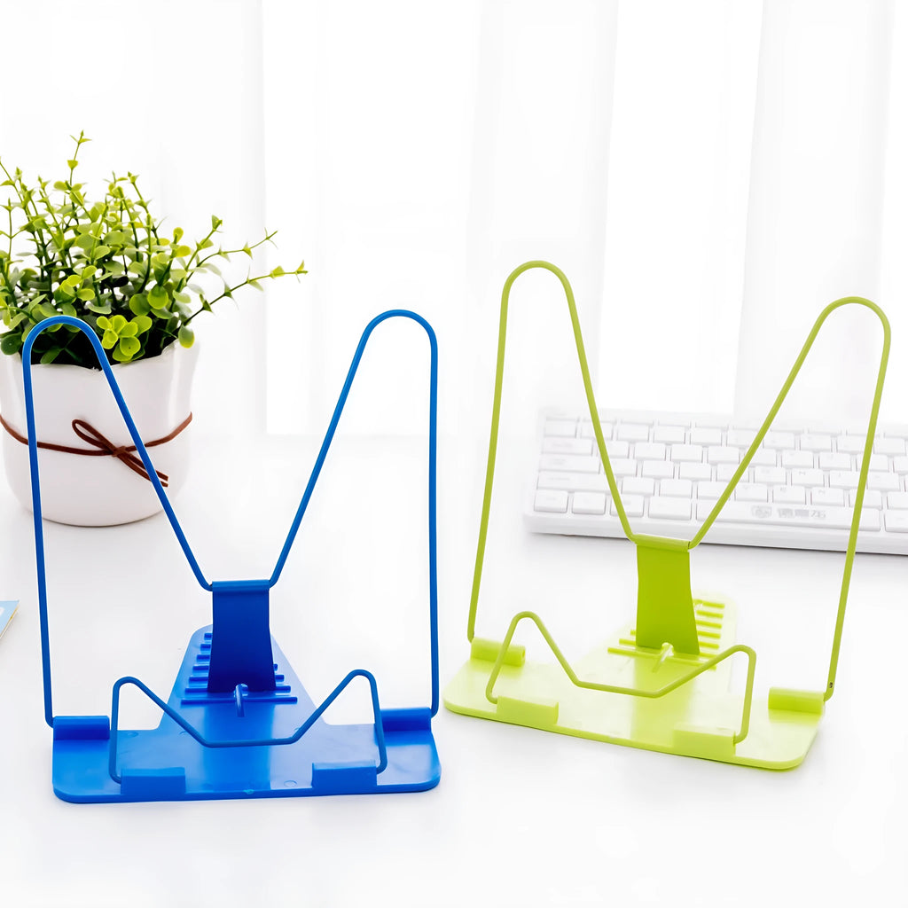 Multifunctional metal and plastic reading frame in blue colour on a desk holding a book upright.
