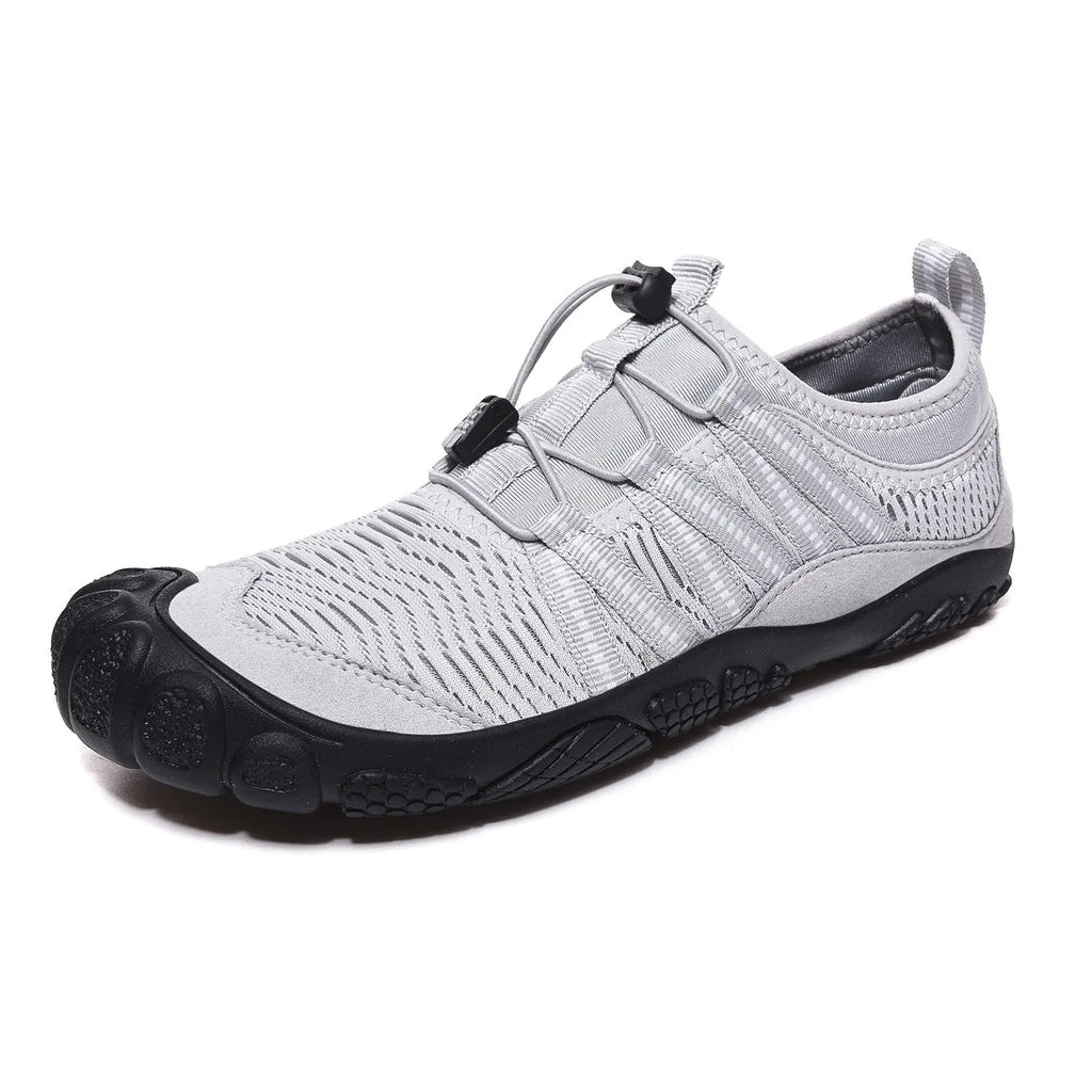 Low-cut unisex mesh wading shoes in black with a rubber sole, suitable for river tracing.