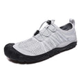Low-cut unisex mesh wading shoes in black with a rubber sole, suitable for river tracing.