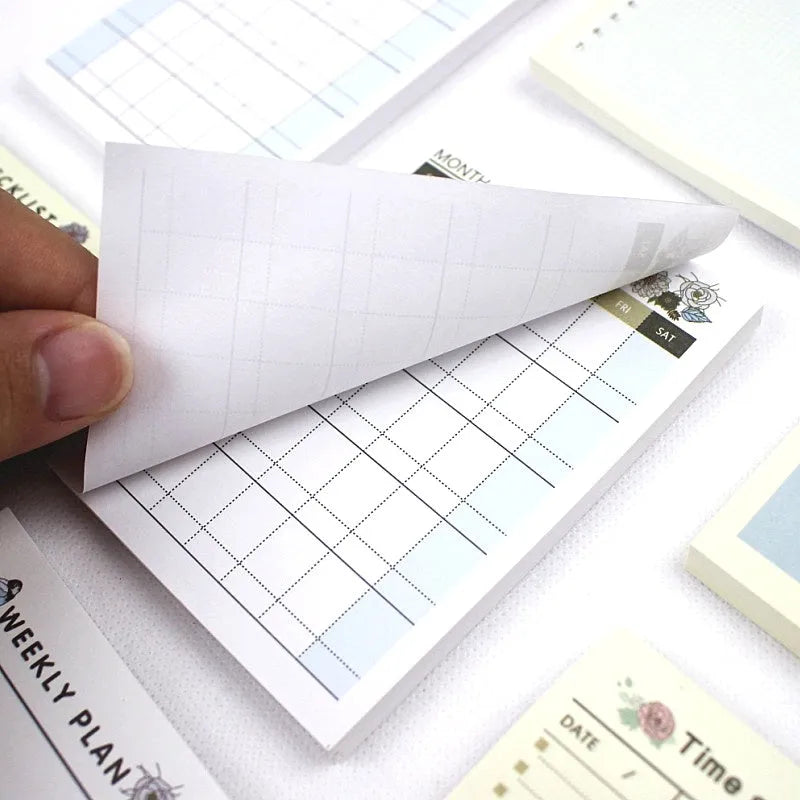 10.2 by 7.2 cm pocket-sized weekly monthly work plan diary notebook in one of four design styles