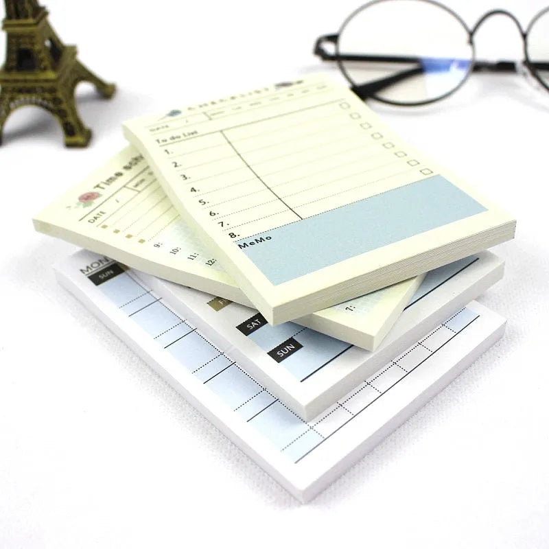 10.2 by 7.2 cm pocket-sized weekly monthly work plan diary notebook in one of four design styles