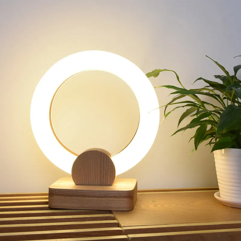 Nordic style wooden circular chandelier with a white Acrylic shade in two size options.