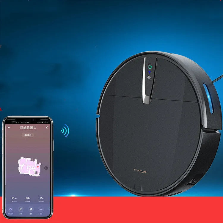 Black and white robotic floor cleaner with charging base, remote control, mop, and water tank on a hardwood floor.