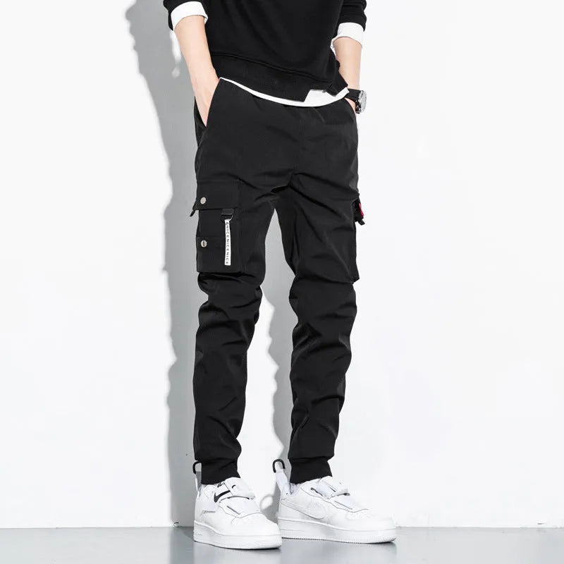 Korean loose cotton cargo pants in black with tether closure and nine-tenths length