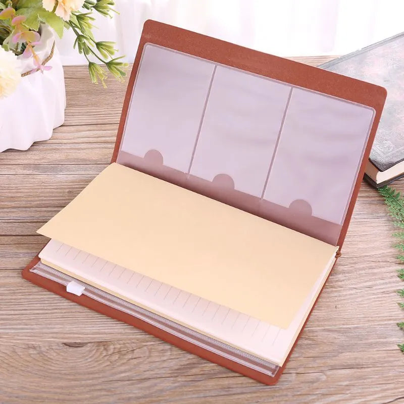 Brown leather hand ledger notebook with strap binding and acid-free paper pages
