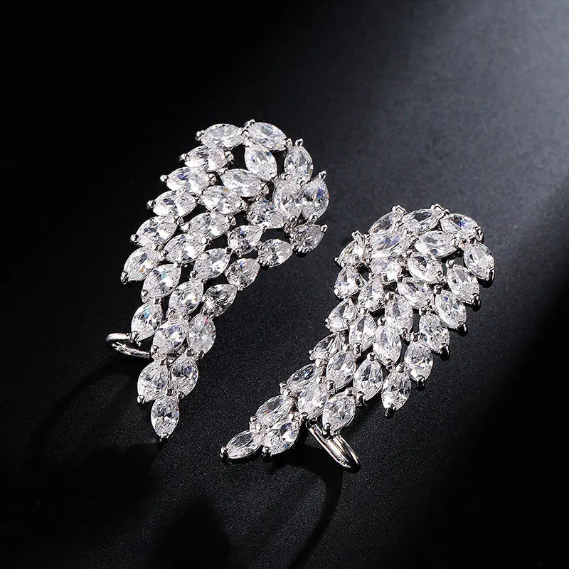White gold colour angel wings stud earrings for women and girls made with AAA zircon, one individually packed pair