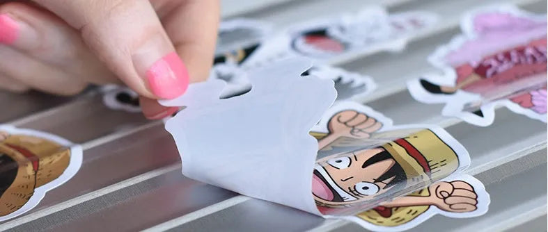 Mixed graffiti sticker collection of 100 self-adhesive luggage labels in cartoon designs