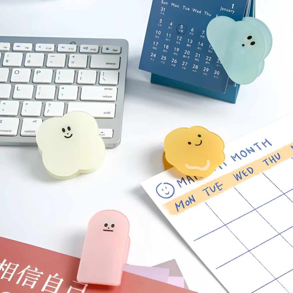 Acrylic decorative clip with cartoon collage design for scrapbooking, shown in beige, blue, orange, and pink.