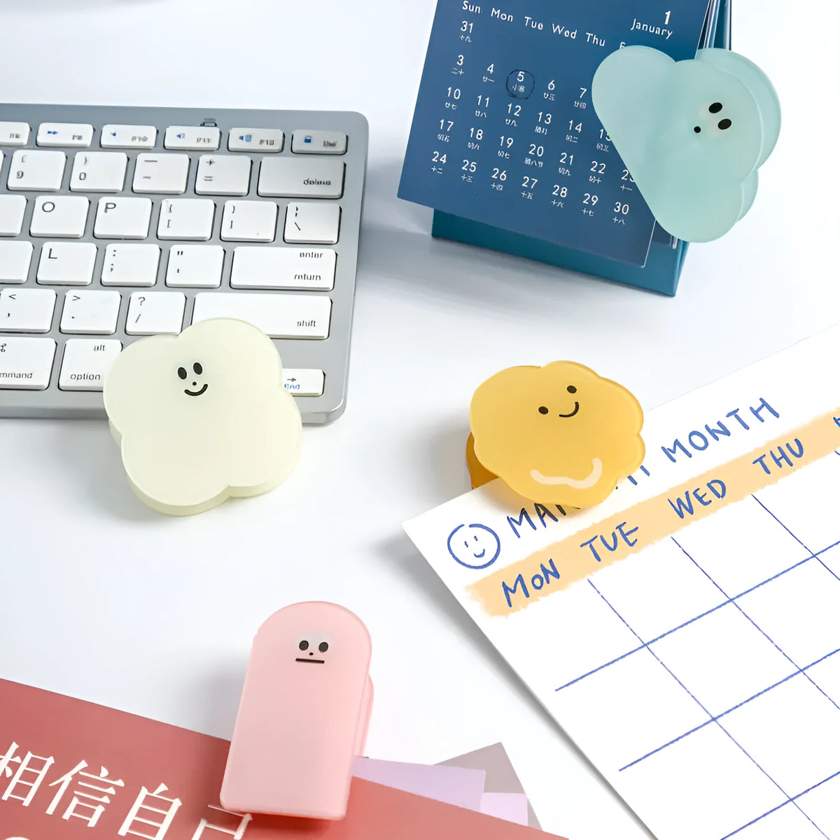 Acrylic decorative clip with cartoon collage design for scrapbooking, shown in beige, blue, orange, and pink.