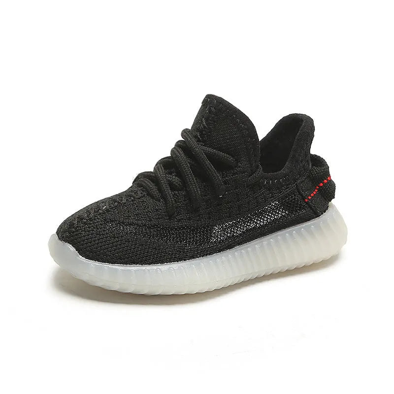 Children's breathable mesh sneakers with non-slip rubber soles in black, white, grey, and orange colours